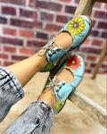 CIPELE NA PERTLANJE SA CVETNIM DEZENOM - PLAVE